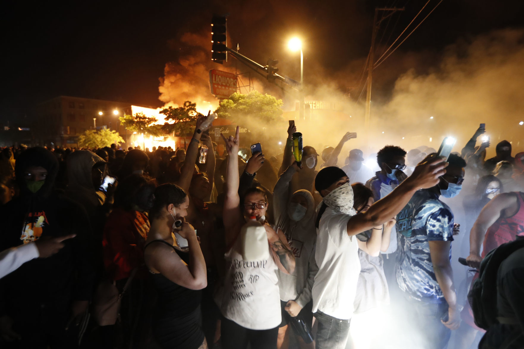 George Floyd protesters set Minneapolis police station afire